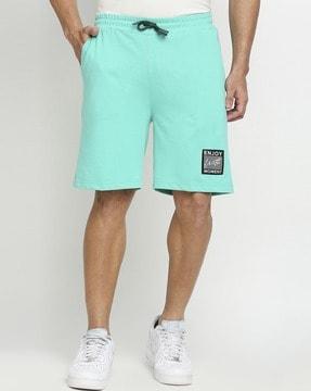 slim fit shorts with elasticated drawstrings waist