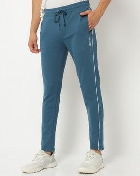 slim fit track pants with contrast piping