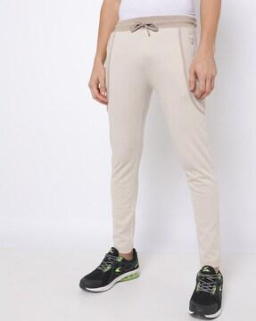 slim fit track pants with zip pockets