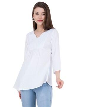 slim-fit tunic with floral embroidered detail