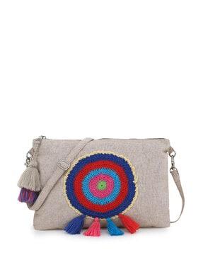 sling bag with embroidered applique