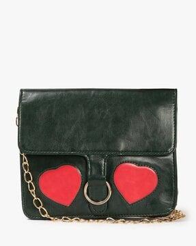 sling bag with heart applique