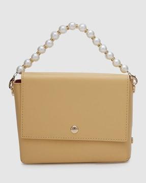 sling bag with pearl strap