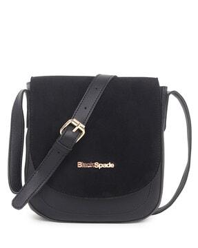 sling bag with snap-button closure