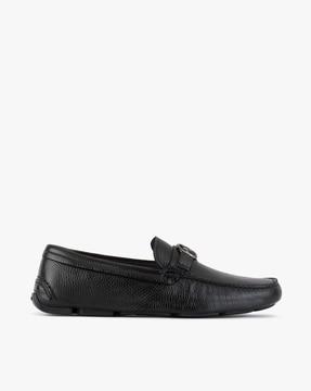 slip-on leather formal loafers with metal logo snaffle