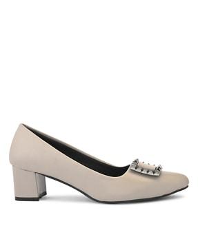 slip-on pumps with metal accent