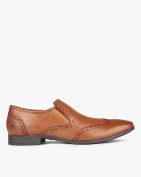 slip-on shoes with brogue