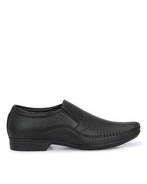 slip-on shoes with stitch accent
