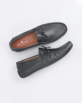 slip-on boat shoes with tassels