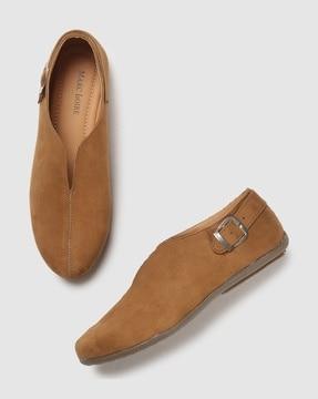 slip-on casual shoes with buckle accent