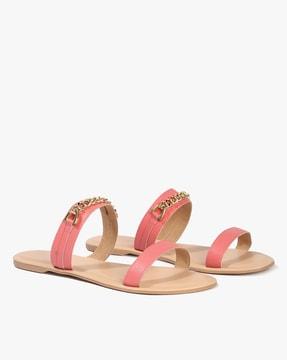 slip-on flat sandals with chain accent