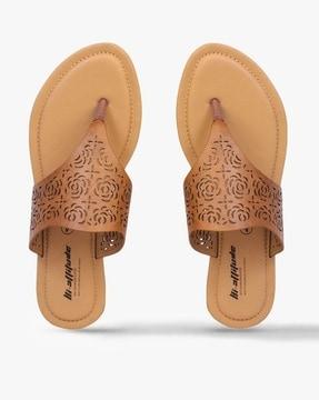 slip-on flat sandals with lacer-cuts