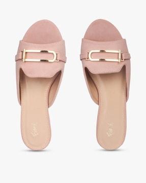 slip-on flat sandals with metal accent