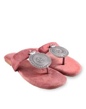 slip-on flat sandals with metal accent