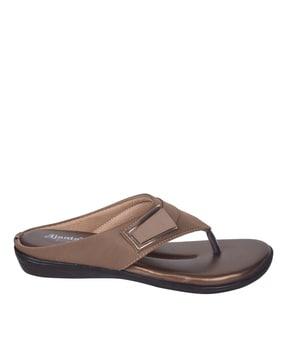 slip-on flat sandals with metal accent