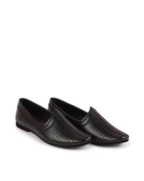 slip-on mojaris with laser cut detail