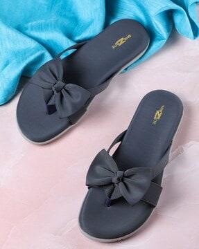 slip-on sandals with bow applique