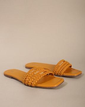 slip-on sandals with braided straps