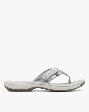 slip-on sandals with buckle accent