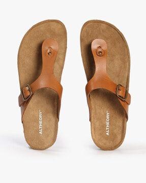 slip-on sandals with buckle accent