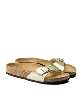 slip-on sandals with buckle closure