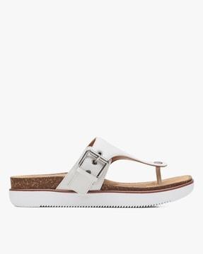 slip-on sandals with buckle closure