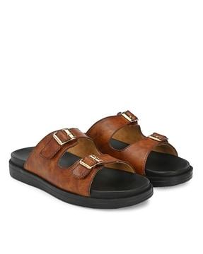 slip-on sandals with buckle detail