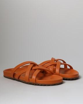 slip-on sandals with criss-cross straps