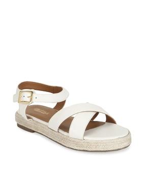 slip-on sandals with criss-cross