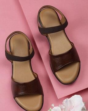 slip-on sandals with elastic closure