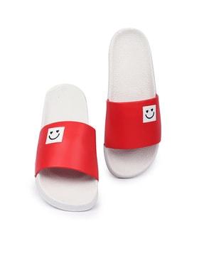 slip-on sandals with emoji detail