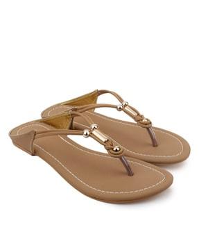 slip-on sandals with metal accent