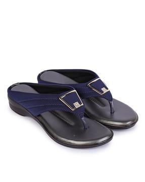 slip-on sandals with metal accent