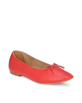 slip-on shoes with bow-accent
