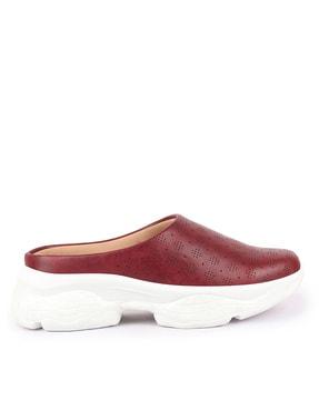 slip-on shoes with perforations
