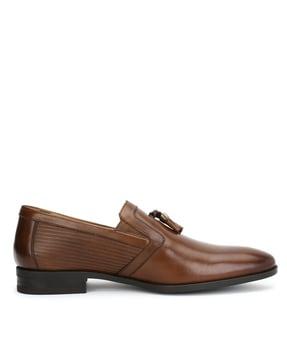 slip-on shoes with tassels