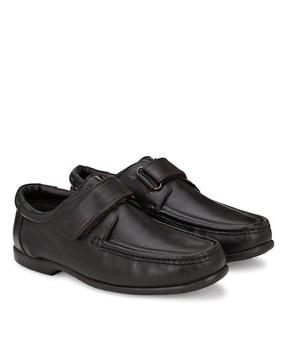 slip-on shoes with velcro fastening