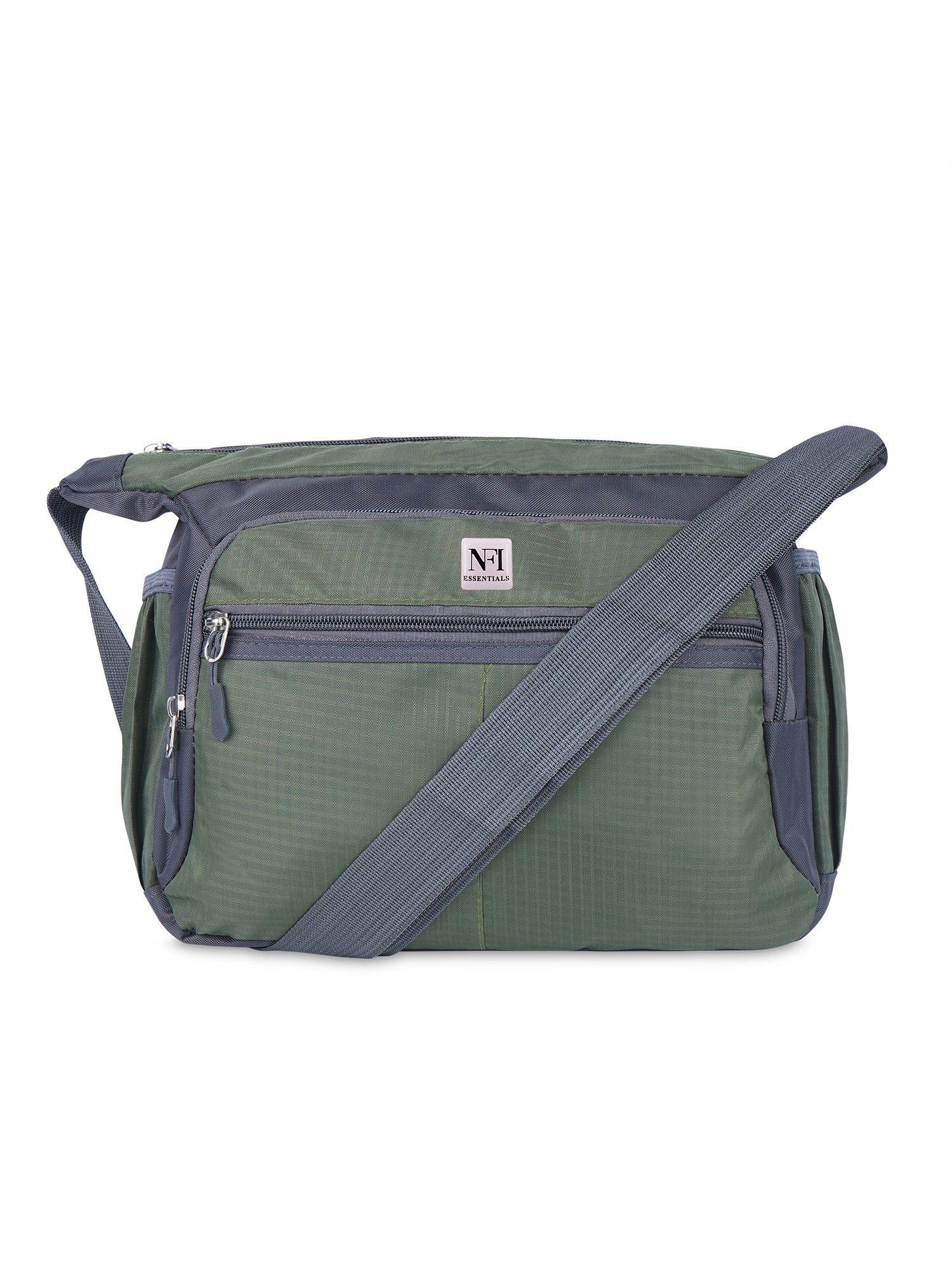 small unisex sling and cross body bag for travelling green