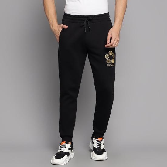 smiley world men solid joggers