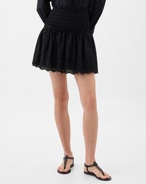 smocked eyelet hem mini skirt