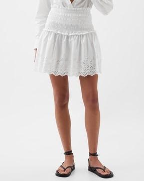 smocked eyelet hem mini skirt