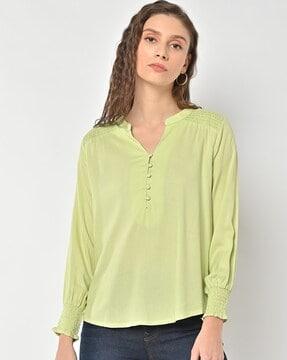 smocked top with cuffed sleeves
