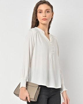 smocked top with cuffed sleeves