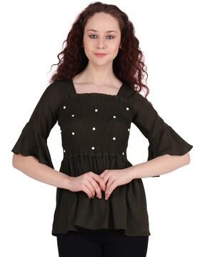 smocked top with embellishments