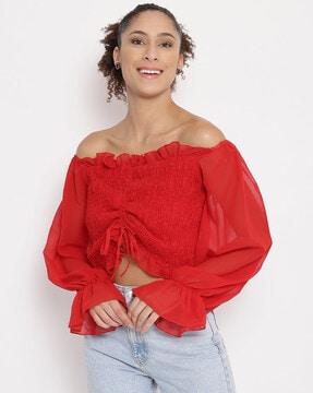 smocked top with puff sleeves