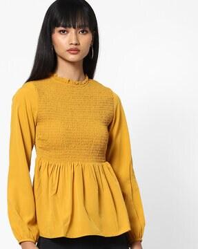 smocked top with ruffled neckline