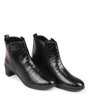 snake-embossed ankle-length boots