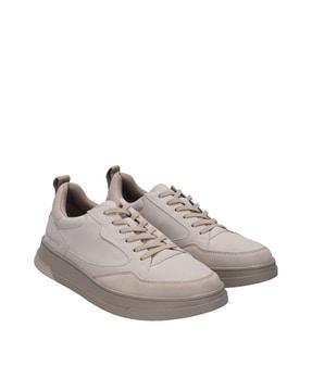 sneakers with lace fastening