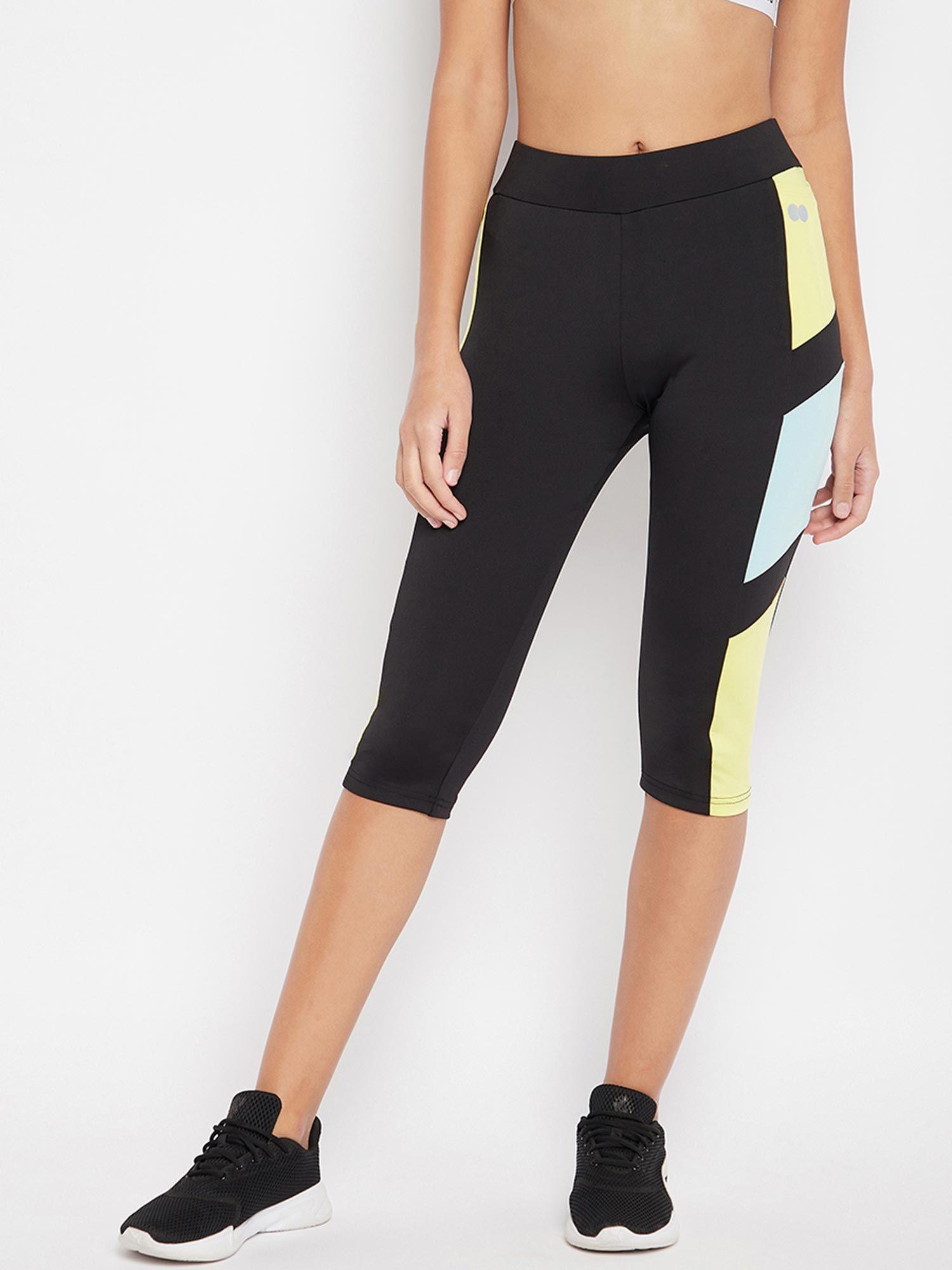 snug fit high-rise active capri in black with coloured side panels