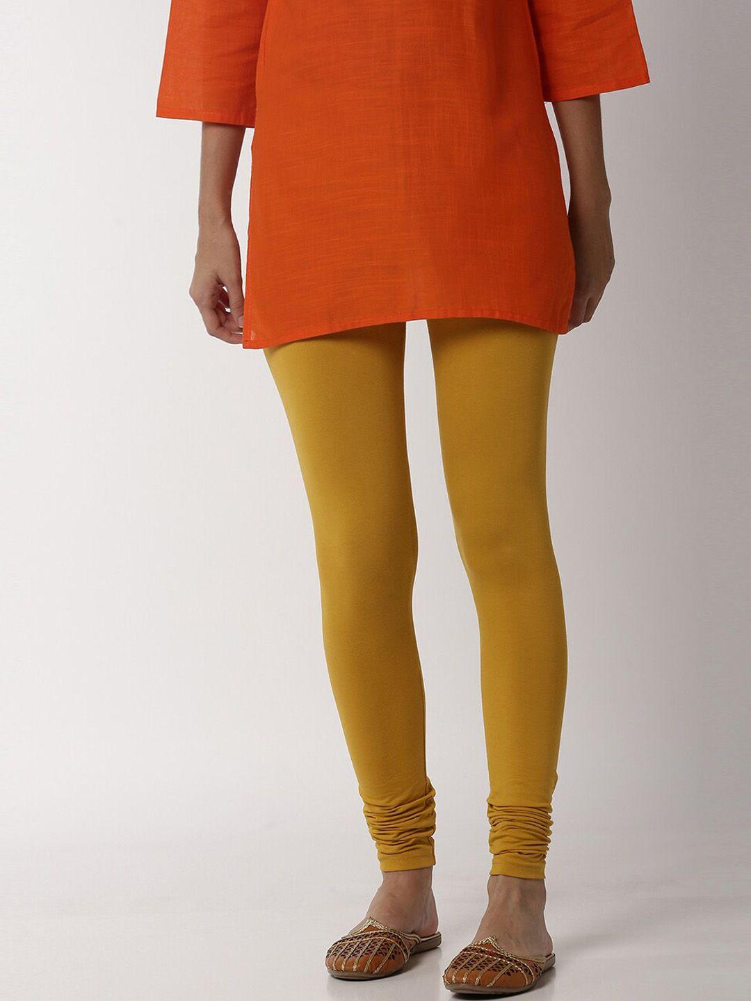 soch women mustard yellow solid cotton leggings